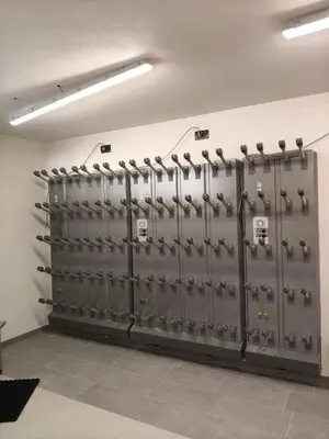 a row of metal lockers in a room at Vacanze la Malga in Predazzo