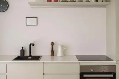 a kitchen with a sink and a counter top at Mountain View Suites in Tesimo