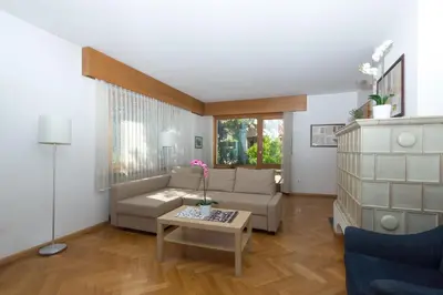 a living room with a couch and a table at Chalet Center Pic in Ortisei