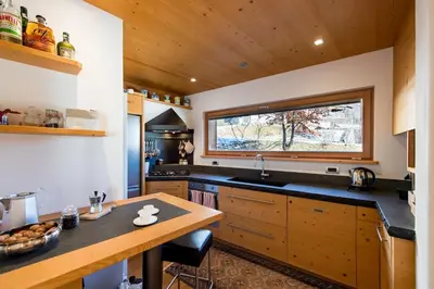 a kitchen with a sink and a window at Awakening in the Dolomites between Pelmo and Antelao in Borca di Cadore