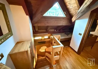an overhead view of a tiny house with a window at HT - Mansarda panoramica nel cuore di San Vito in San Vito di Cadore