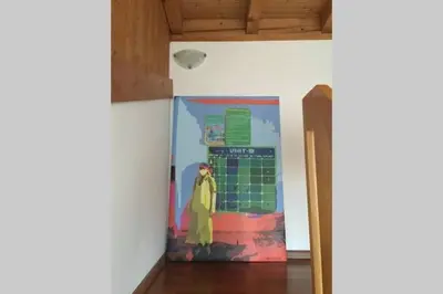 a painting of a person on the side of a wall at Casa Similde e Casa Dolasilla in centro in Bolzano