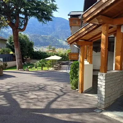 a building with a view of a mountain at Hotel Angerer in Bressanone