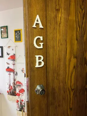 a door with the letters a and b on it at Cambra AGB in Campestrin