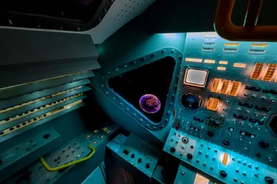 an inside view of a space shuttle cockpit at Apollo11 in Collepietra
