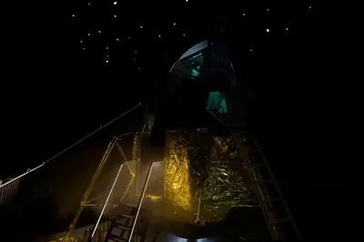 a person standing on top of a ship at night at Apollo11 in Collepietra