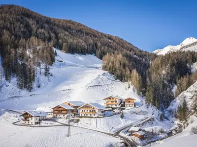 a ski lodge in the snow on a mountain at Apartment Zirbe by Interhome in Selva dei Molini