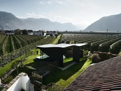 a view of a vineyard from the roof of a house at Holiday Home Mirror House Nord by Interhome in Bolzano