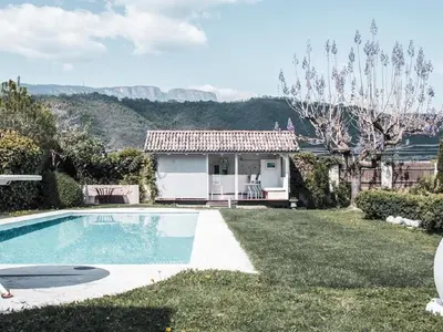 a house with a swimming pool in a yard at Holiday Home Mirror House Nord by Interhome in Bolzano