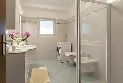 a bathroom with a toilet and a sink and a shower at Tai Bedoes in Moena