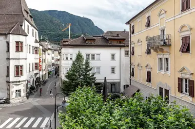 a view of a street in a city with buildings at Stay COOPER l MAVIK Suite & Attic in Bolzano