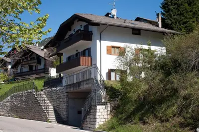a house on the side of a hill at Casa Dolci by Sunhome Fiemme in Tesero