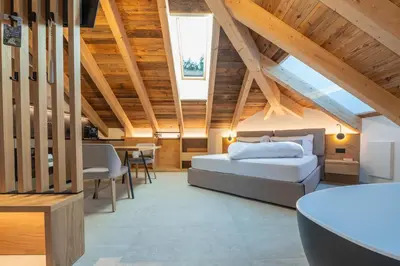 a laundry room with a sink and a washing machine at Il rifugio dei sogni - Exclusive Apartments in San Sigismondo