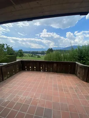 a balcony with a view of the mountains at Villa Claudio in Cavareno