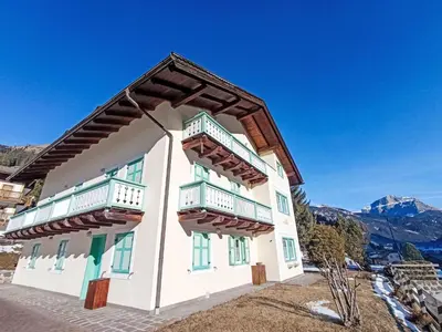 a house with balconies on the side of it at Apartment Cesa sot Larsec by Interhome in Campestrin