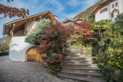 a set of stairs leading up to a house at Villa Sissi in Laives