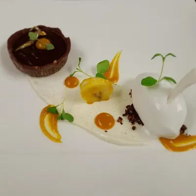 a plate of food on a white background at Hotel Grones in Ortisei