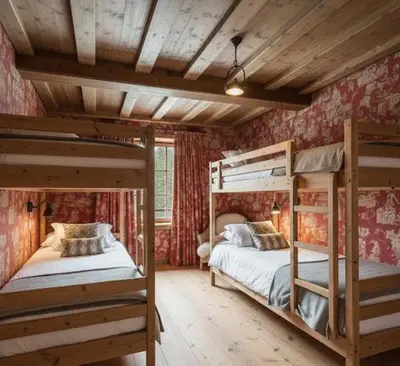 two bunk beds in a room with red wallpaper at Dolomiti Magic in Cortina dʼAmpezzo