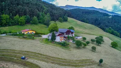 an aerial view of a house on a hill at Appartament Eichnerhof in Chienes