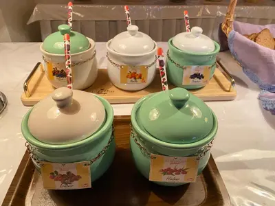 a group of pots and pans on a table at Hotel Friedemann in Rasùn di Sotto