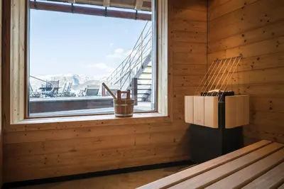 a room with a window with a view of a mountain at Mountain Chalet Pia in La Valle