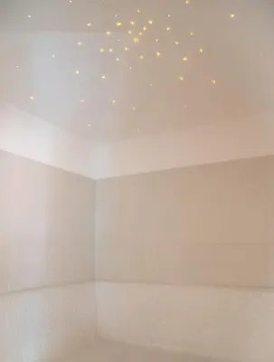 a room with a ceiling with stars on it at Gasthof Innerwalten in San Leonardo in Passiria