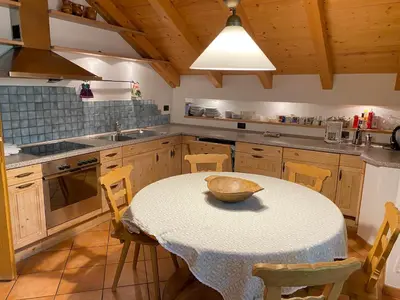 a kitchen with a table with a bowl on it at Im weißen Schlössl Friedemann in Rasùn di Sotto
