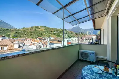 a balcony with a view of a city at Appartements König in Merano