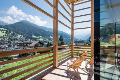 a view of a village in the mountains at Chalet Sophia in Ortisei