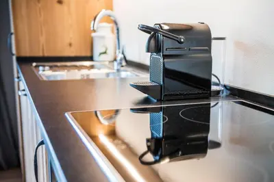 a toaster sitting on top of a kitchen counter at Chalet Sophia in Ortisei