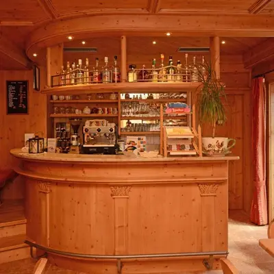 a bathroom with a toilet and a sink and a shower at La Campagnola in Canazei