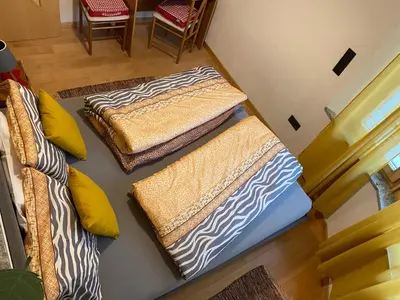 three beds sitting on the floor in a room at Villa Alessandra in Colle Isarco