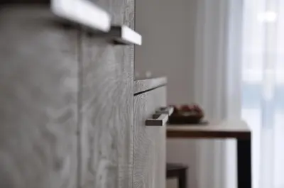a close up of a wooden door in a room at Alpenchalet Apartments in Parcines