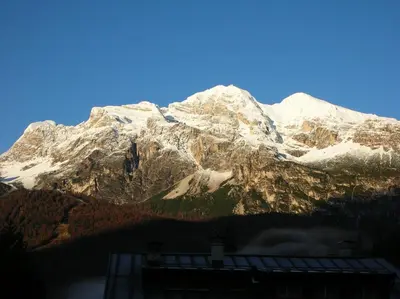 a view of a snow covered mountain at Daniela Apartment in Cortina dʼAmpezzo