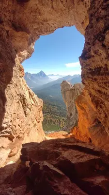 a view from a window in a rock formation at Daniela Apartment in Cortina dʼAmpezzo