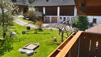 an aerial view of a yard with a house at Oberlindnerhof in San Lorenzo di Sebato