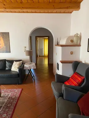a living room with two couches and a table at Weishof in Termeno