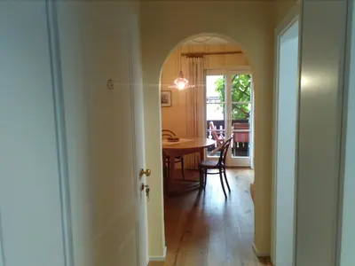 an open door to a dining room with a table at Haus Tinkhauser in Vilpiano