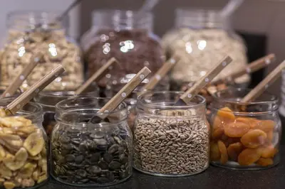 a table with jars of different types of food at Seppmair in Lagundo