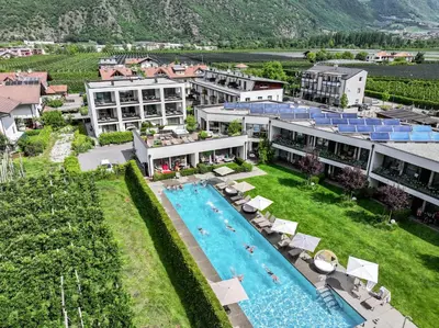 an aerial view of a resort with a swimming pool at Residence & Sportlodges Claudia in Plaus