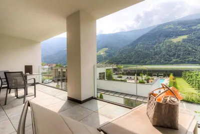 a balcony with a view of a mountain at Residence & Sportlodges Claudia in Plaus