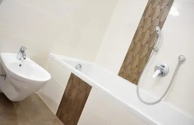 a white bathroom with a sink and a toilet at Cesa Setil in Ortisei