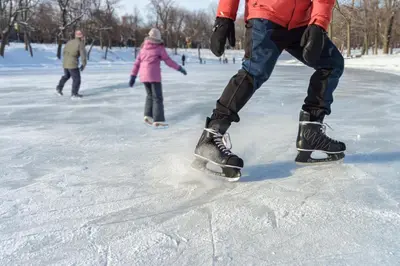 a group of people skating on the ice at B&B Boutiquehotel Clara in Brunico