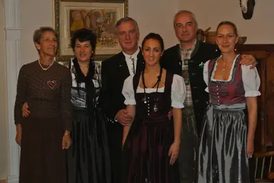 a group of people posing for a picture at Hotel Regina in San Martino di Castrozza