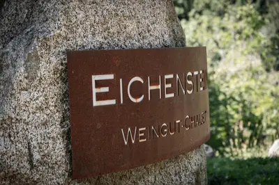 a sign on the side of a tree at Romantik Chalet im Weingut Eichenstein in Merano
