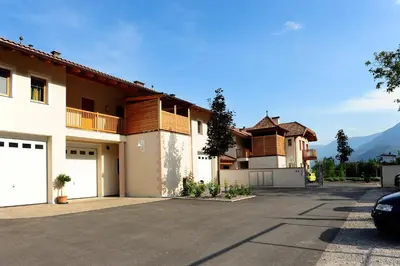 a house with a car parked in front of it at Ansitz Waldner Oberwirt in Marlengo