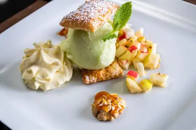 a white plate with some food on it at Familienhotel Viktoria in Ultimo