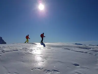 two people standing on top of a snow covered slope at Camere Nordest Sudest- Conca Agordina in Agordo