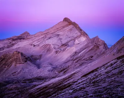 a mountain with a purple sky in the background at Casa Serac´ in La Valle