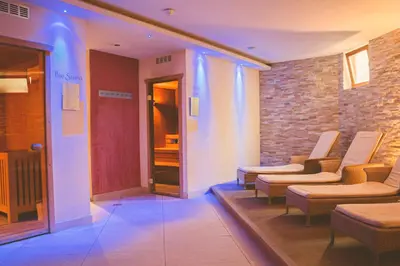 a waiting room with chairs and a corridor at Vegan Hotel La Vimea in Naturno